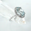 Oval Aquamarine diamond halo ring in white gold