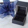 Black ring box shown with available gift wrapping